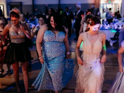 Women dancing at a fancy event