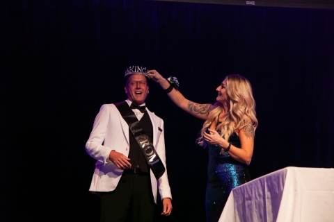 man being crowned prom king
