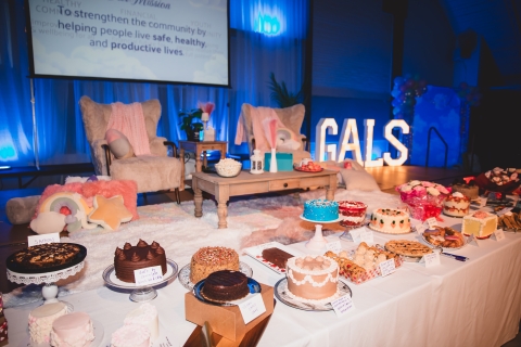 A table laid with many desserts