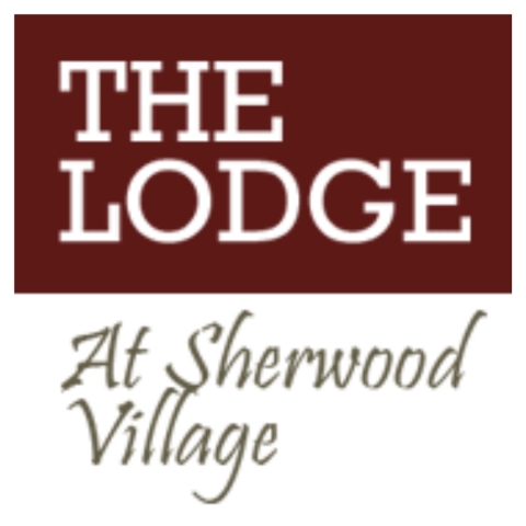 Brown and white square reading the lodge at sherwood village